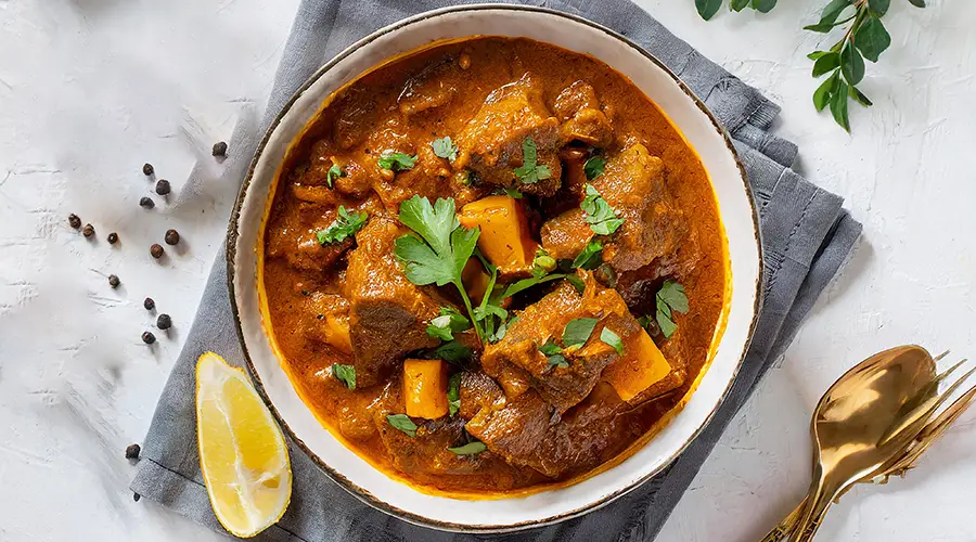 book-a-table-lamb-balti-in-highland.webp