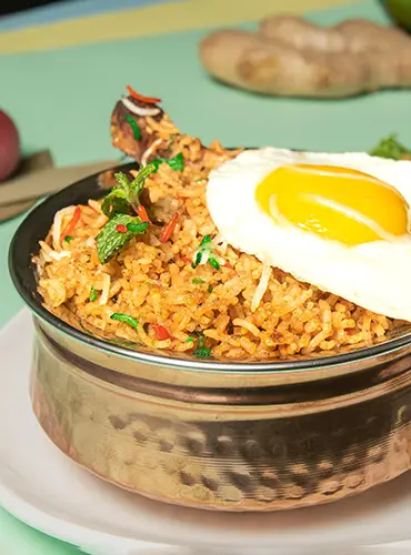 steamed-chicken-biryani-delivery.webp